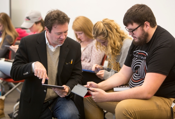 Jesse Kavadlo speaking at an event